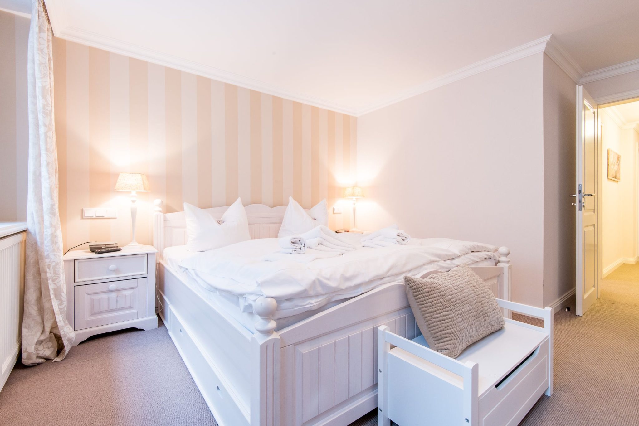 Schlafzimmer mit Doppelbett in Ferienhaus auf Sylt