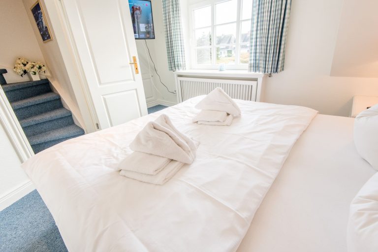 Doppelbett in Ferienhaus auf Sylt
