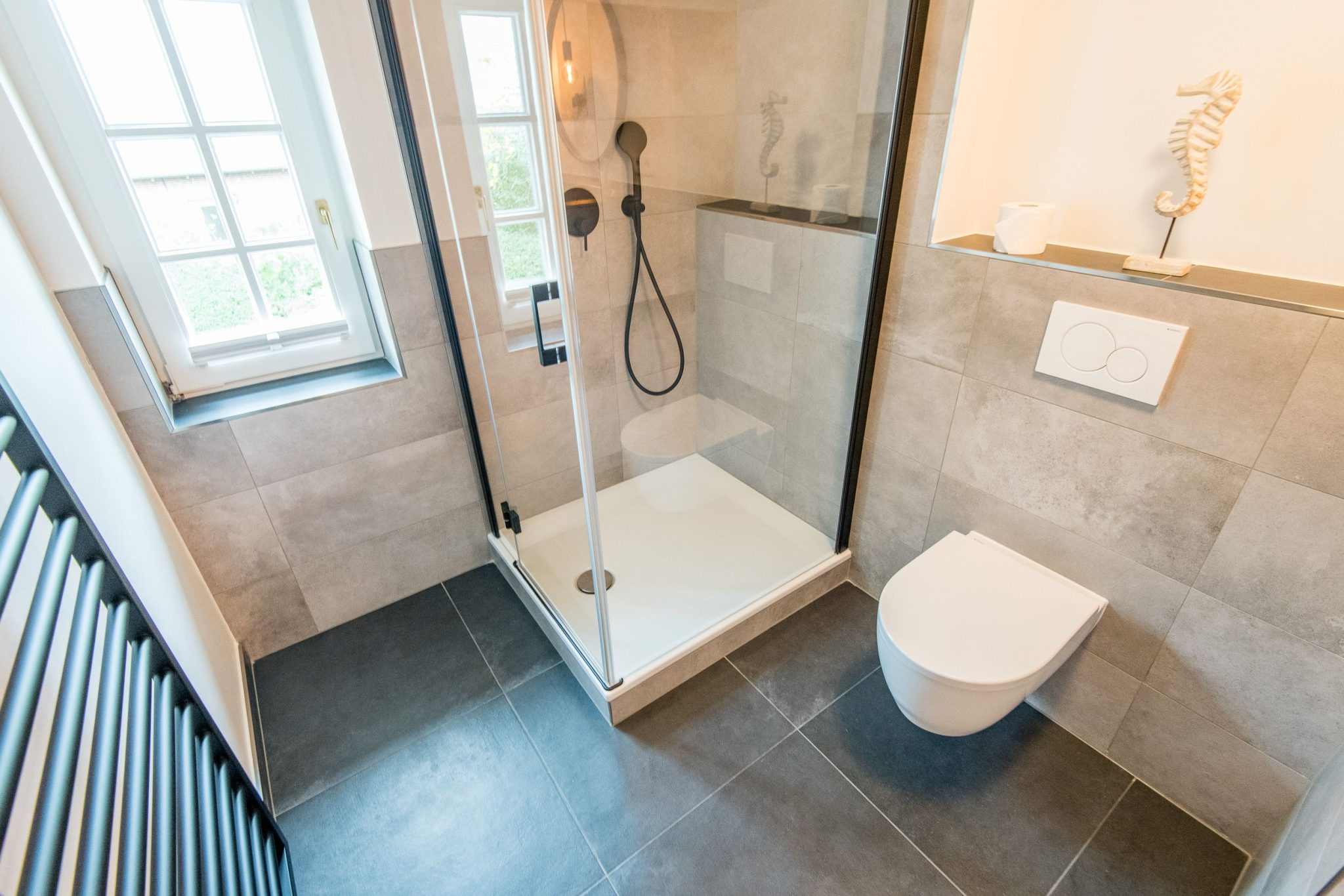 Badezimmer mit Dusche in Ferienhaus auf Sylt