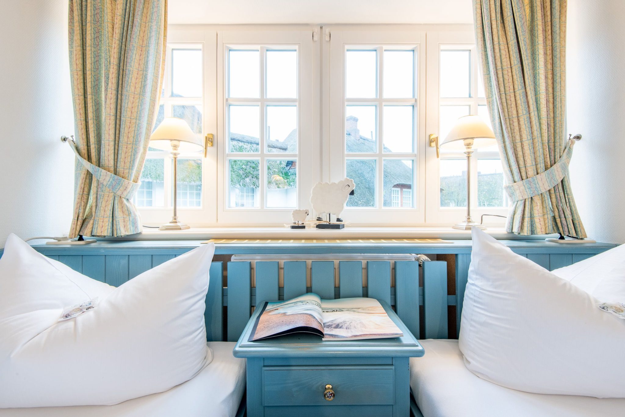 Schlafzimmer mit Einzelbetten in Ferienhaus auf Sylt