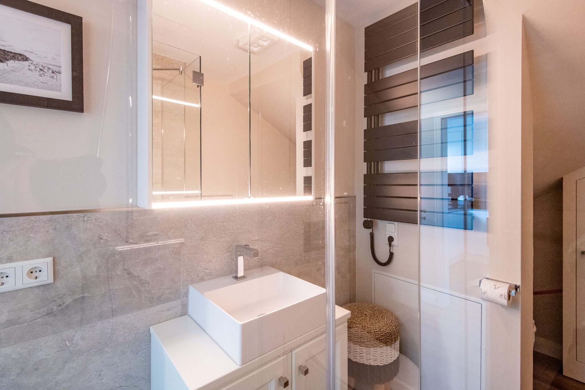 Badezimmer mit Dusche in Ferienhaus auf Sylt