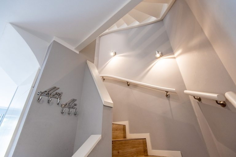 Treppe mit Garderobe in Ferienhaus auf Sylt