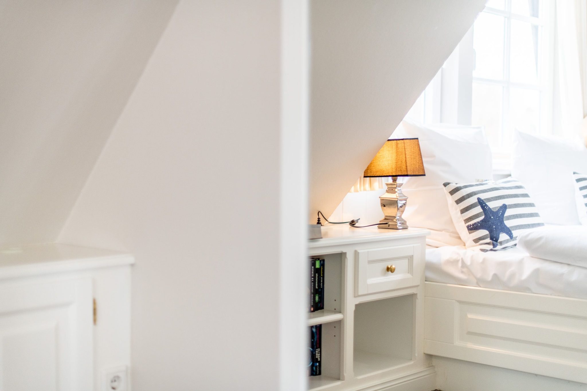 Schlafzimmer mit Doppelbett in Ferienhaus auf Sylt