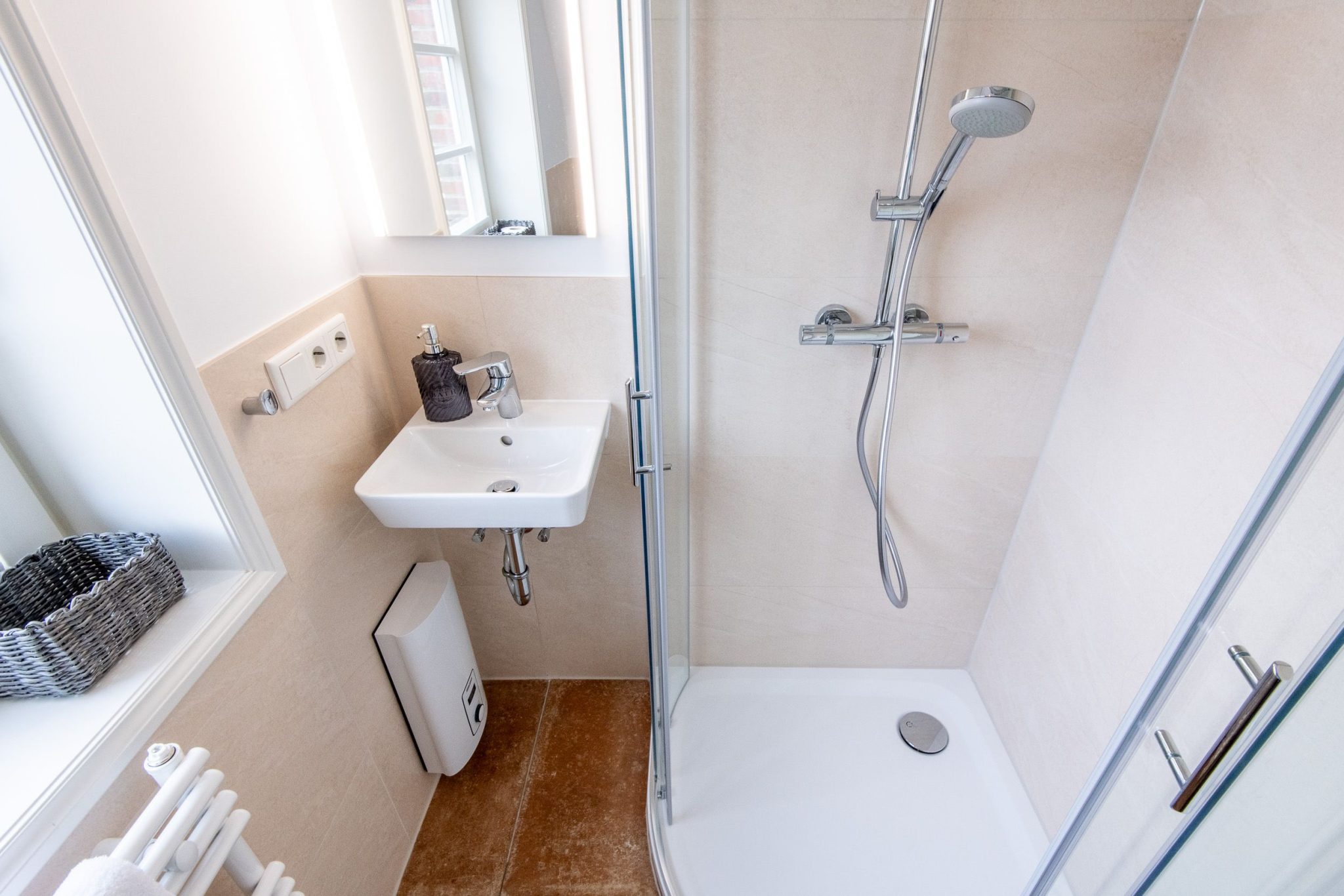 Badezimmer mit Dusche in Ferienhaus auf Sylt
