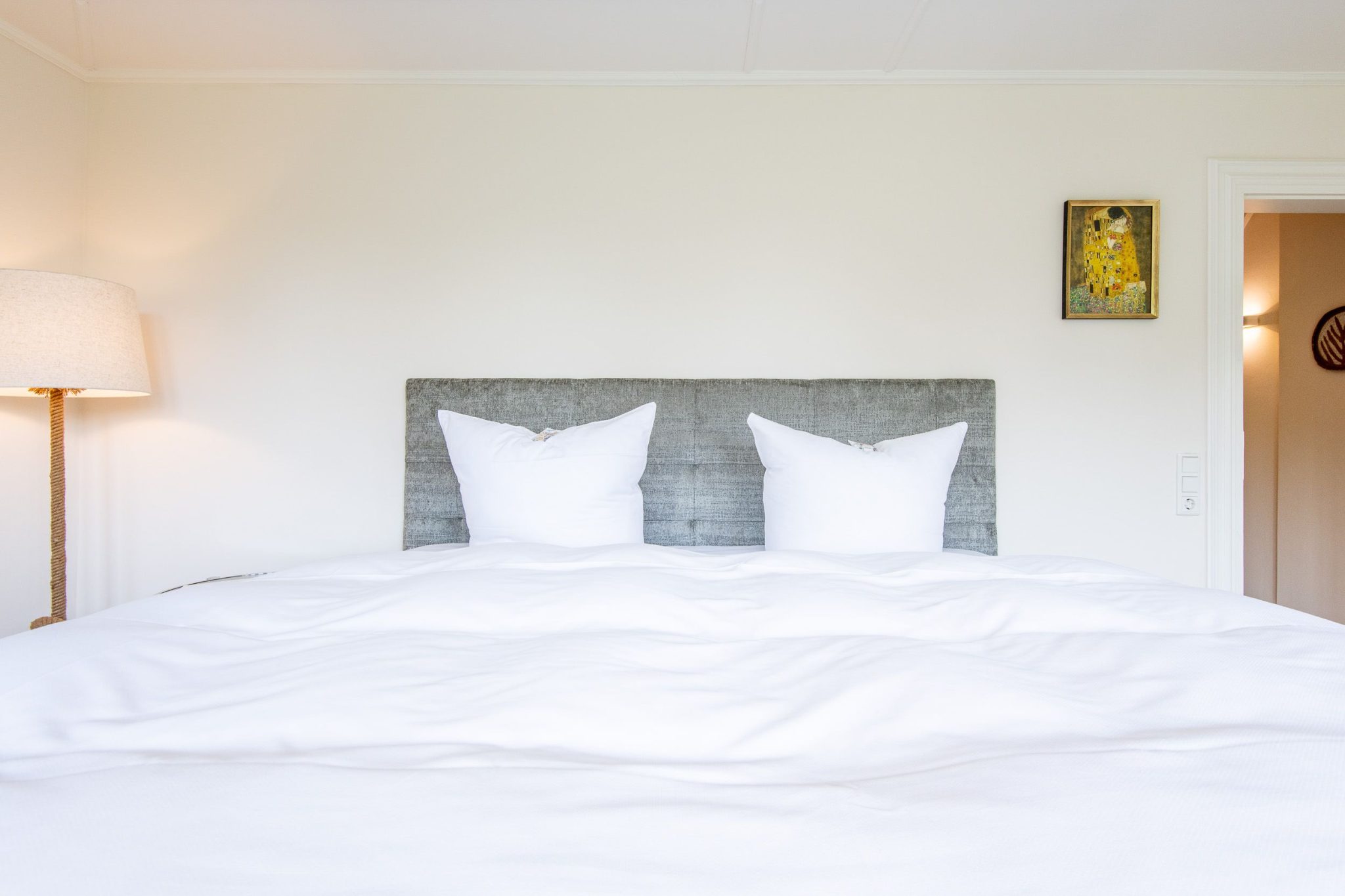 Schlafzimmer mit Doppelbett in Ferienhaus auf Sylt