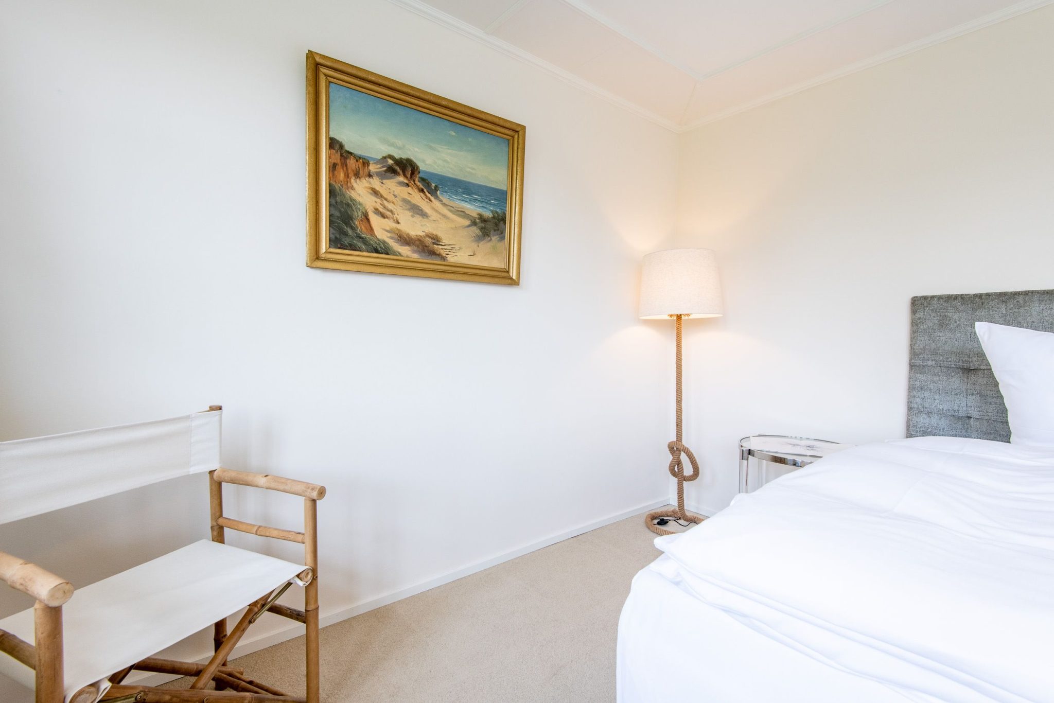 Schlafzimmer mit Doppelbett in Ferienhaus auf Sylt