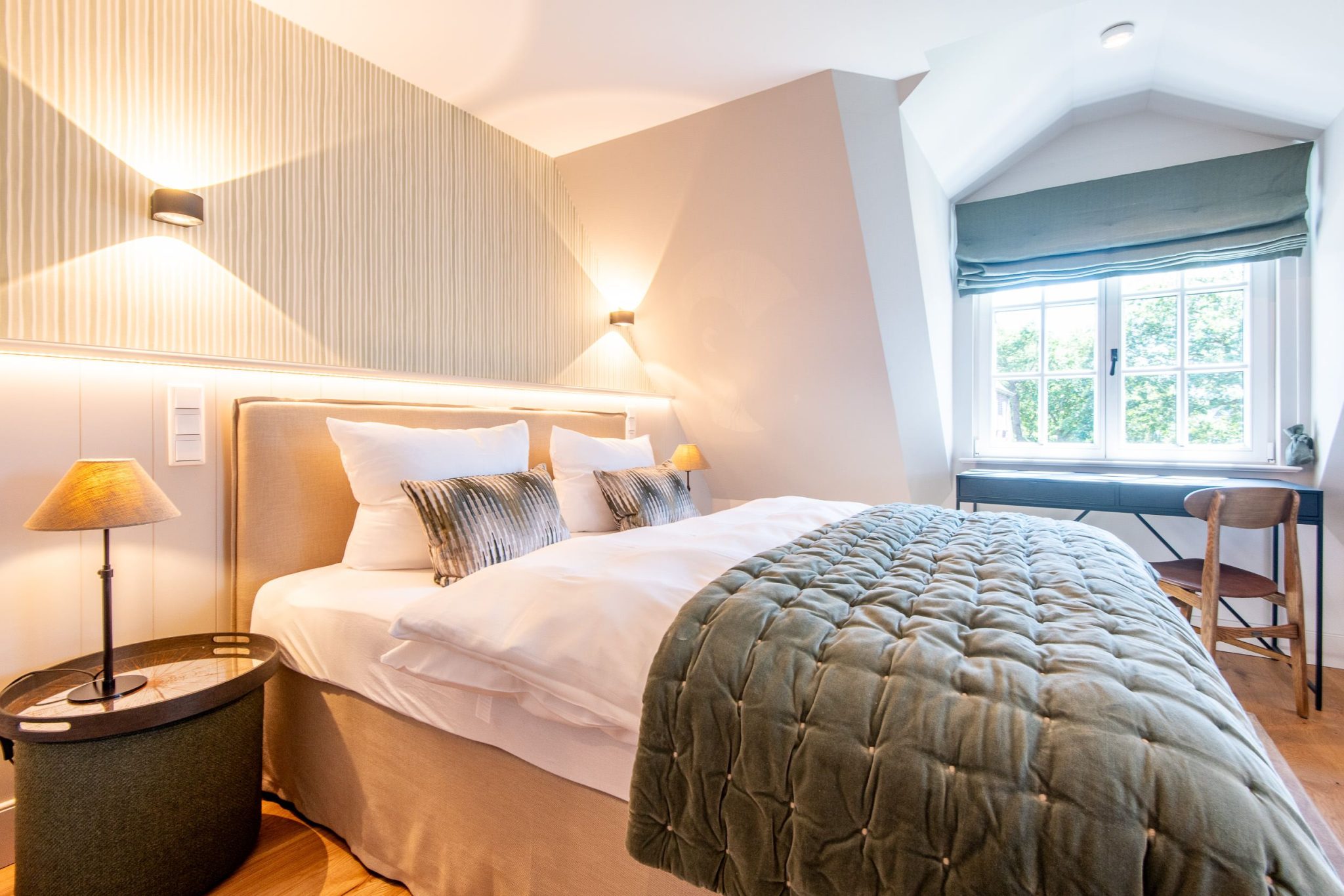Schlafzimmer mit Doppelbett in Ferienhaus auf Sylt