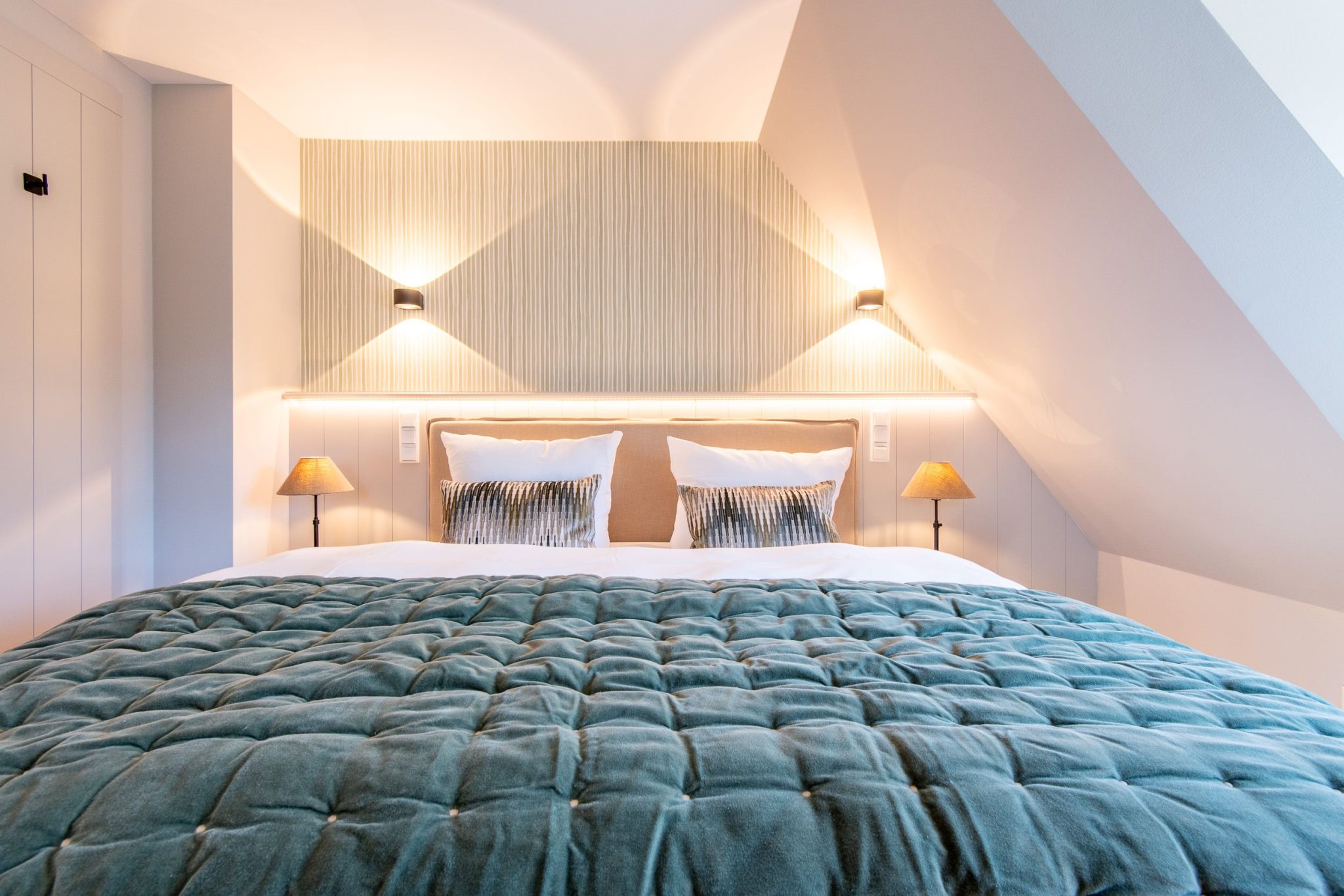 Schlafzimmer mit Doppelbett in Ferienhaus auf Sylt