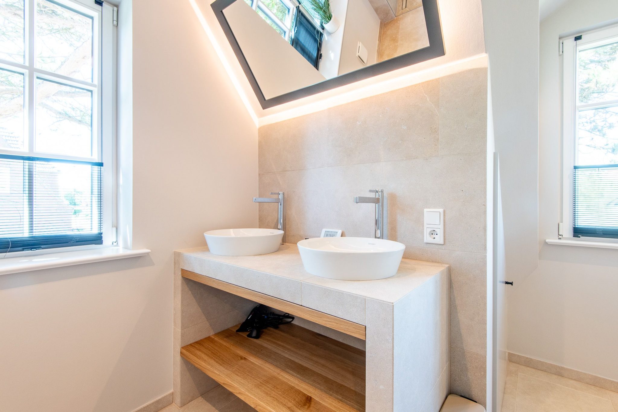 Badezimmer mit Waschbecken in Ferienhaus auf Sylt