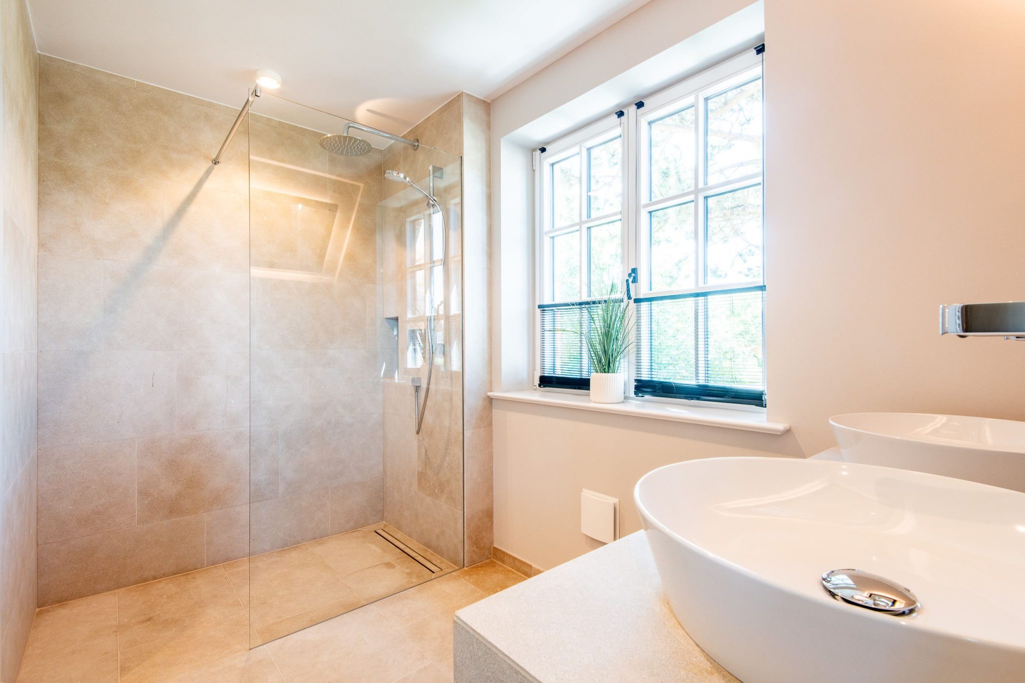 Badezimmer mit Dusche in Ferienhaus auf Sylt