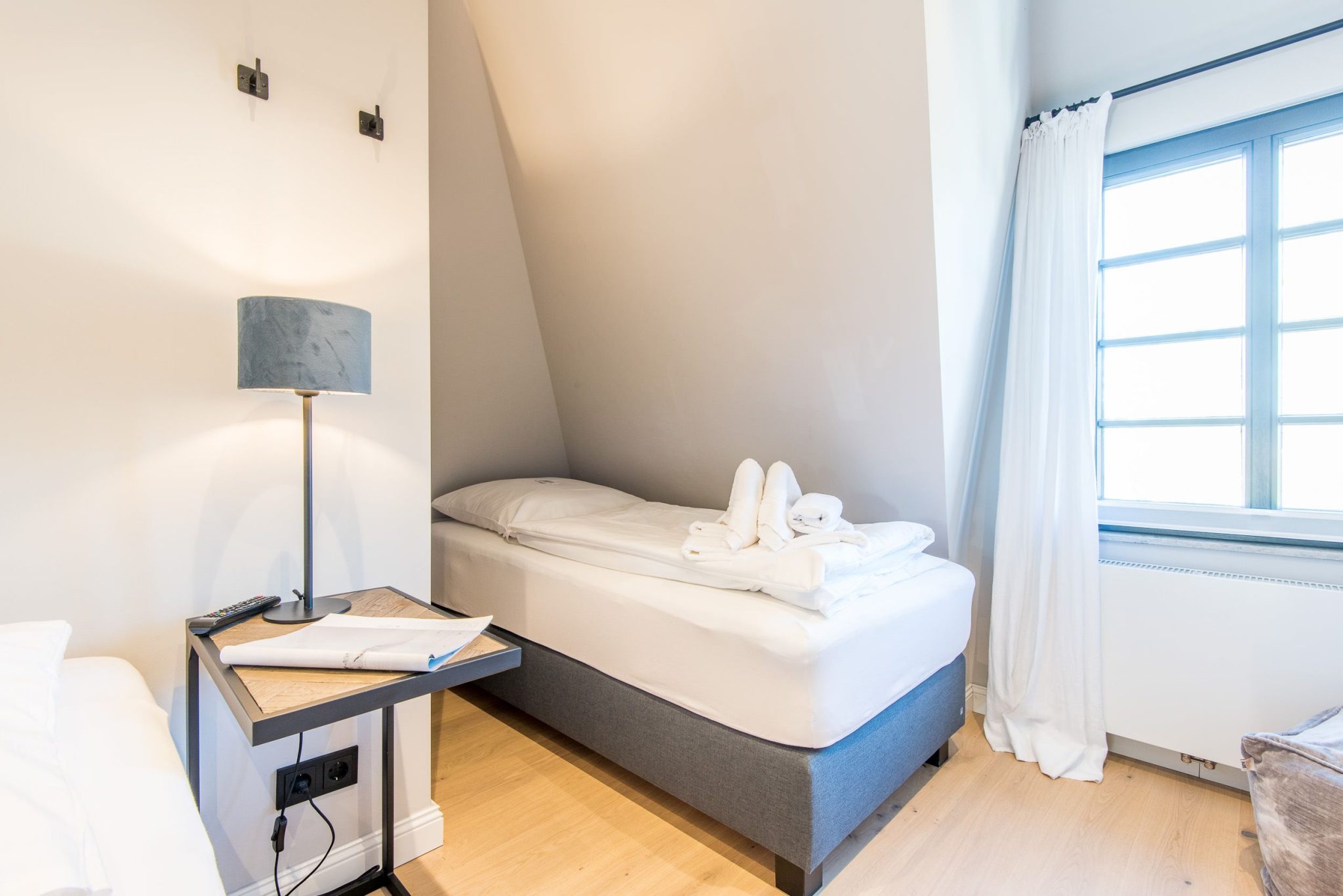 Schlafzimmer mit zwei Einzelbetten in Ferienhaus auf Sylt