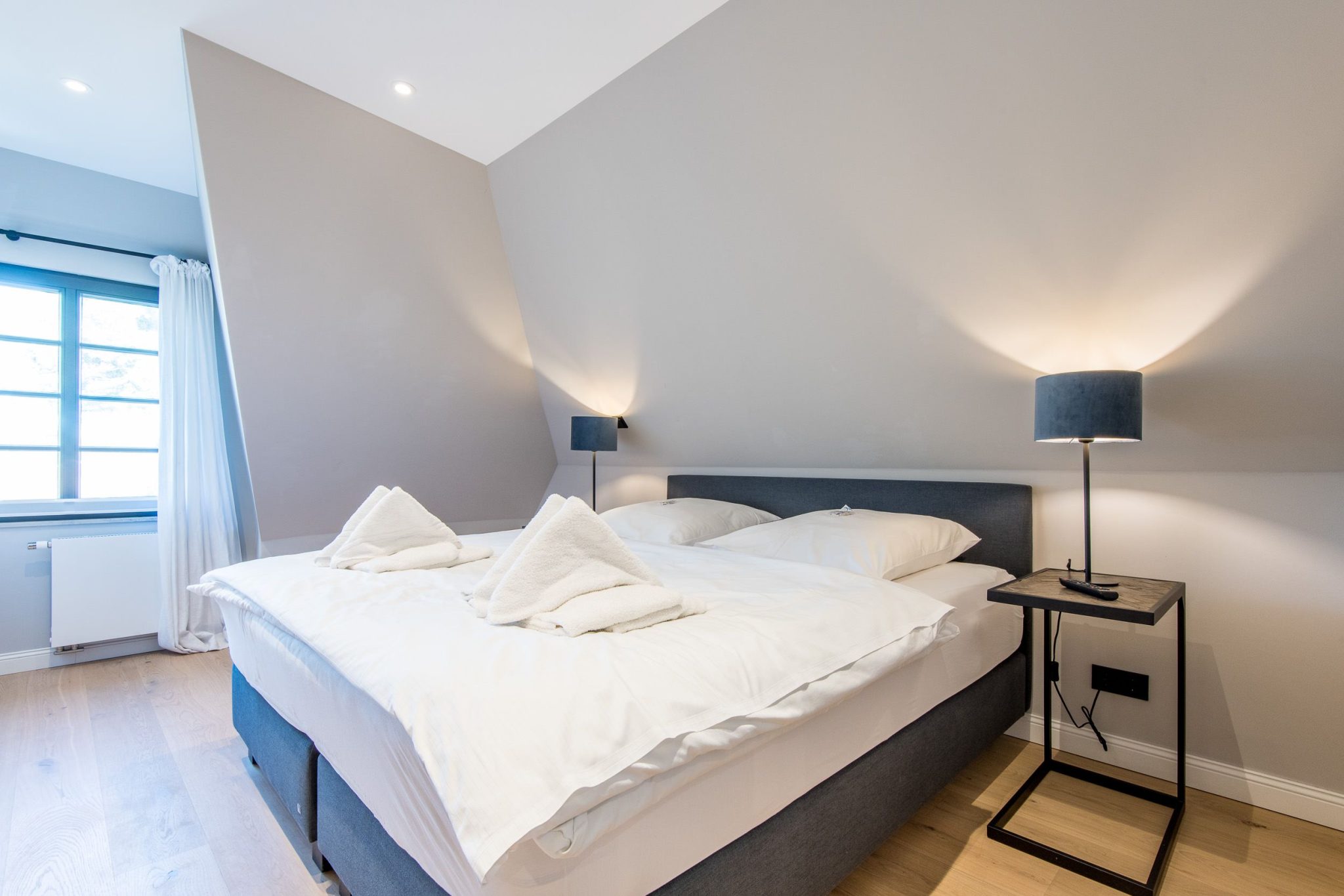 Schlafzimmer mit Doppelbett in Ferienhaus auf Sylt