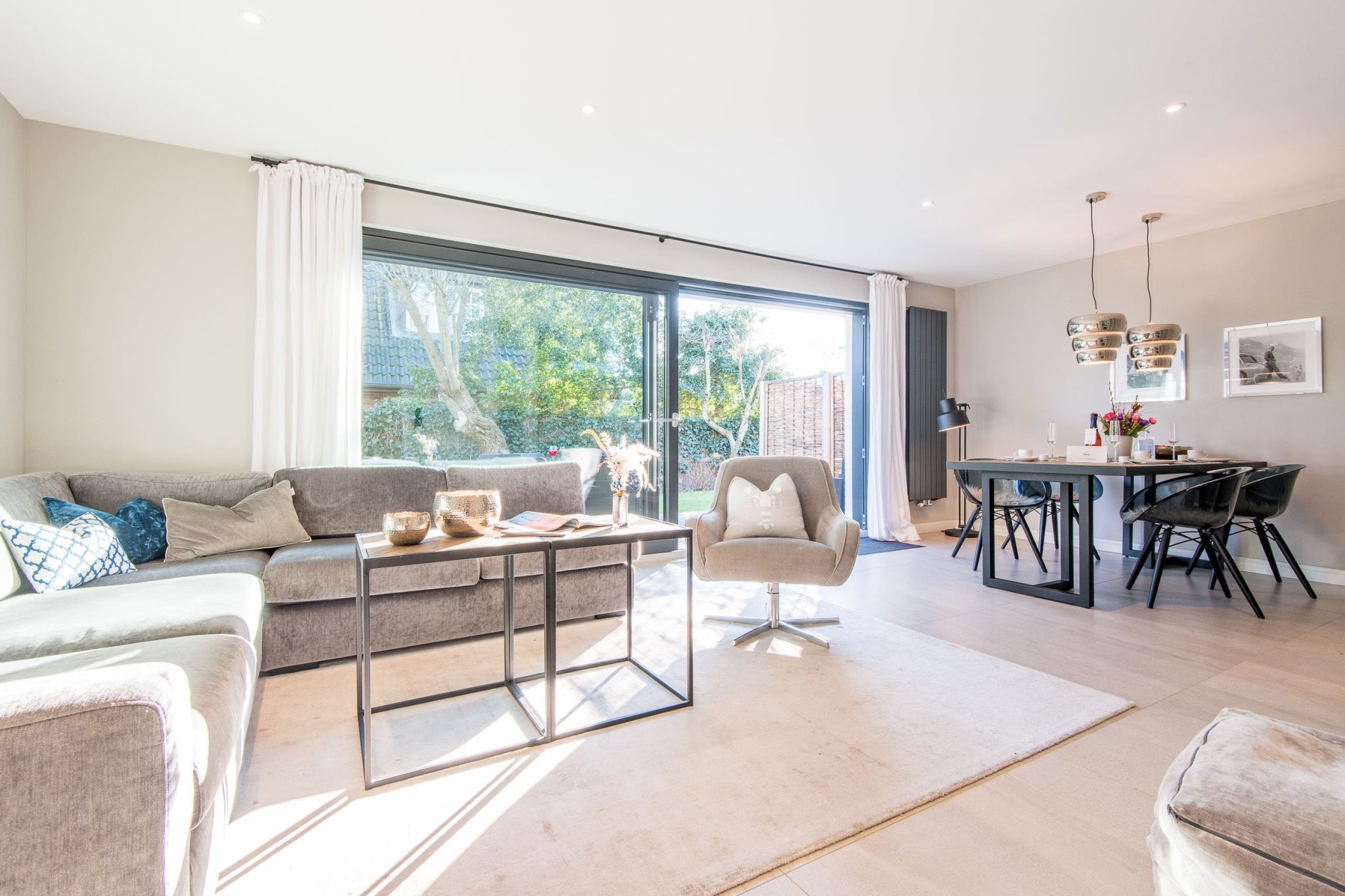 Wohnzimmer mit Esszimmer in Ferienhaus auf Sylt