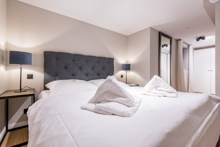 Schlafzimmer mit Doppelbett in Ferienhaus auf Sylt