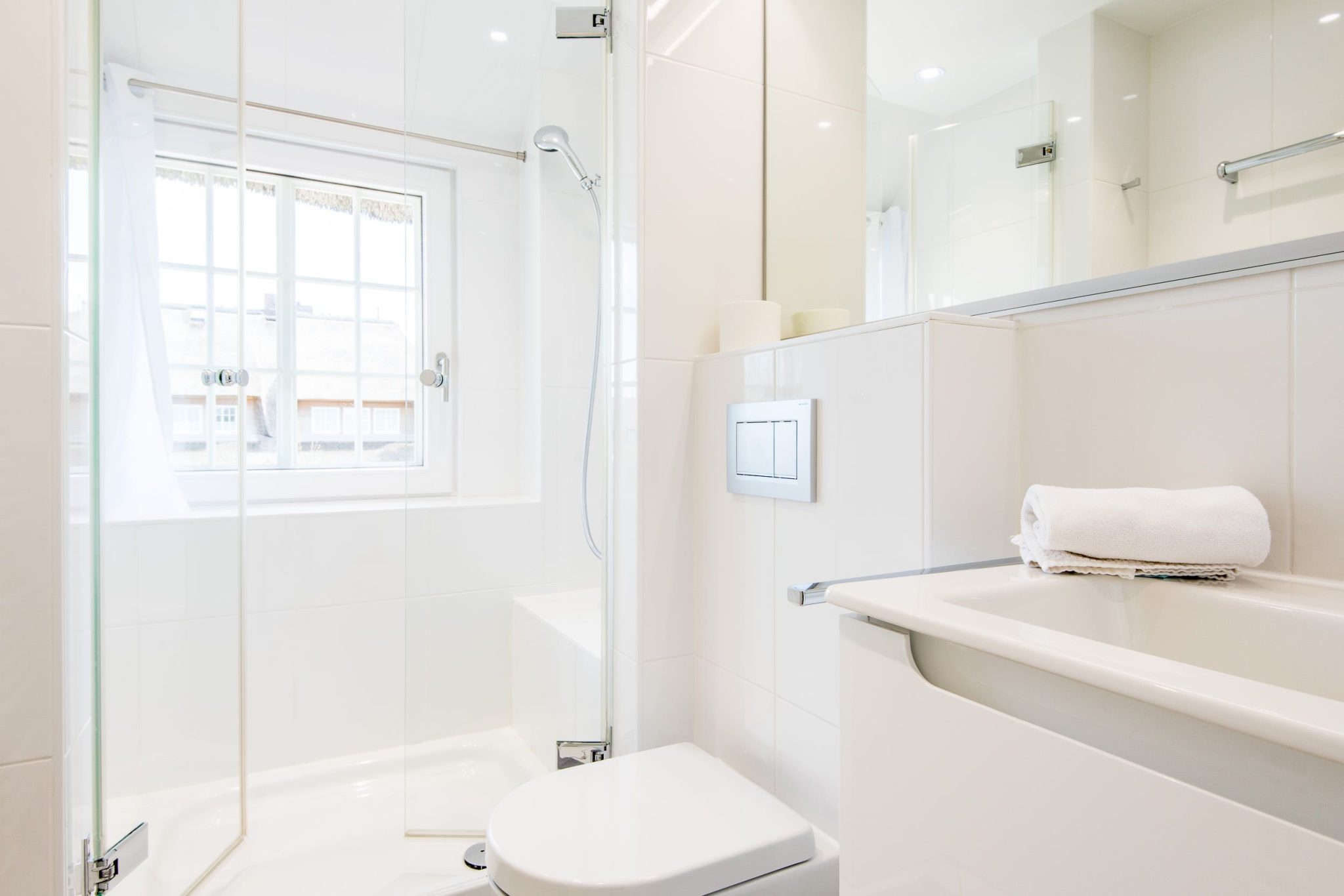 Badezimmer mit Dusche in Ferienhaus auf Sylt