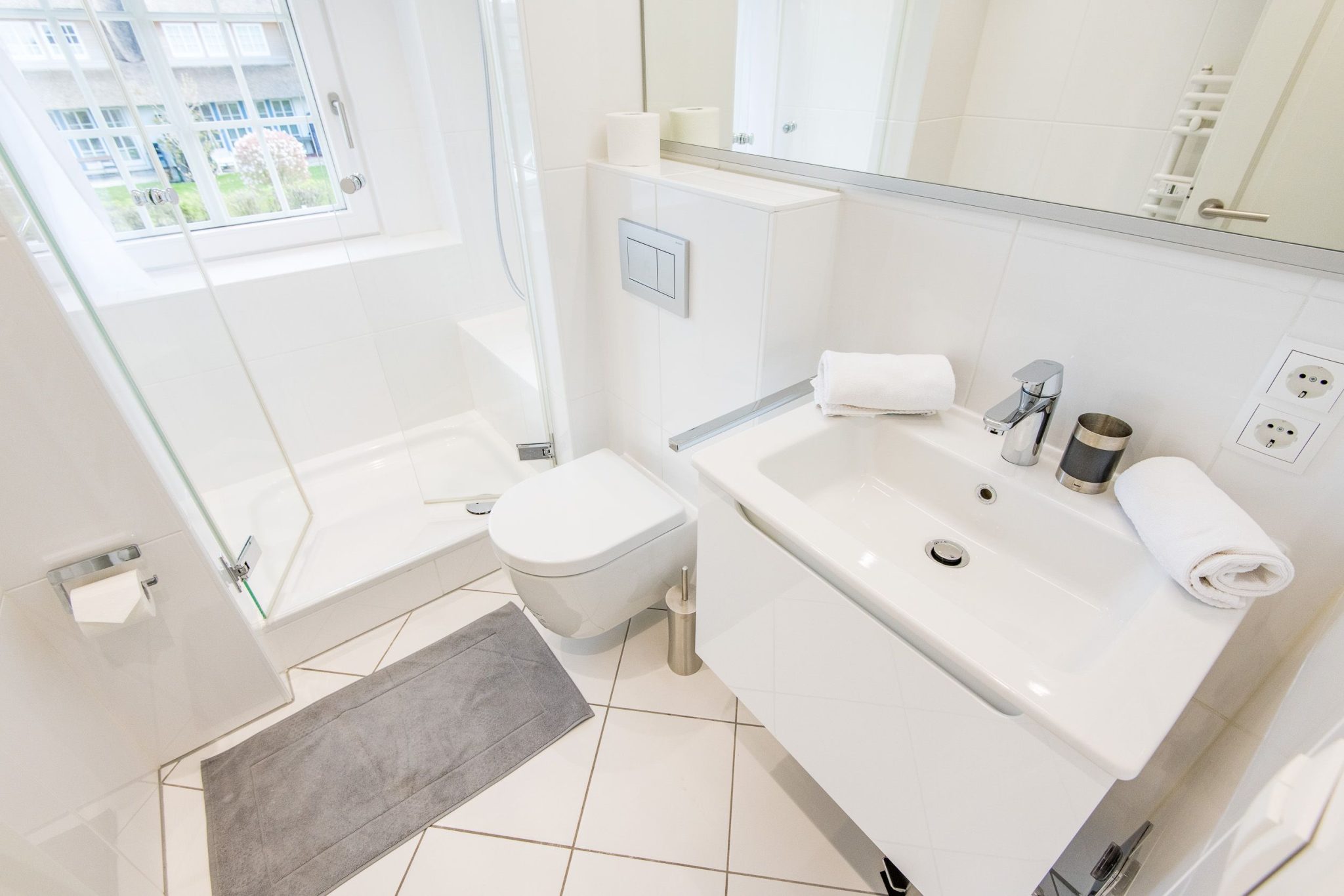 Badezimmer mit Dusche in Ferienhaus auf Sylt