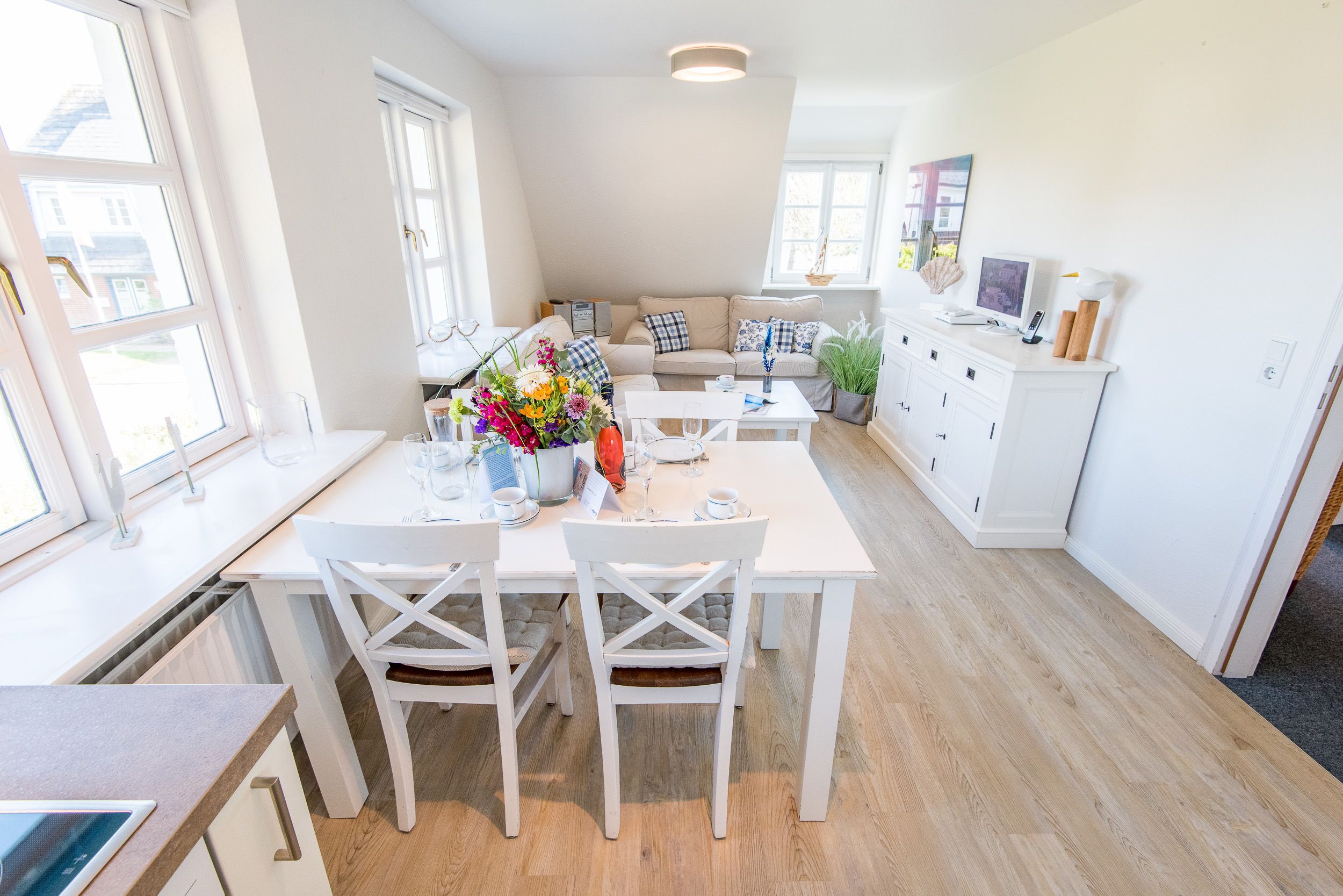 Esszimmer und Sofa in Ferienhaus auf Sylt