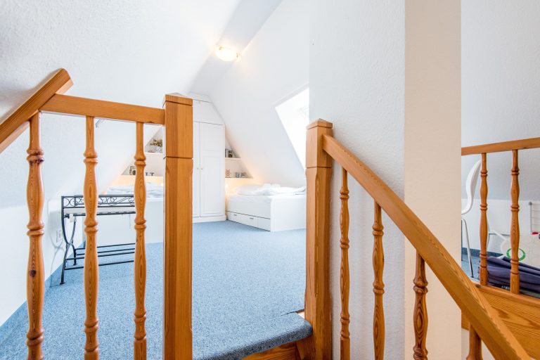 Schlafzimmer mit zwei Einzelbetten in Ferienhaus auf Sylt