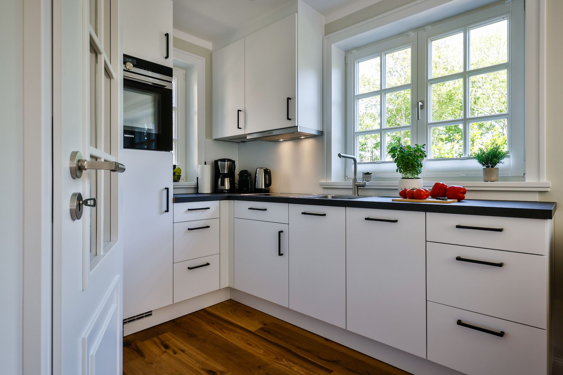 offene Küche und Ofen in Ferienhaus auf Sylt