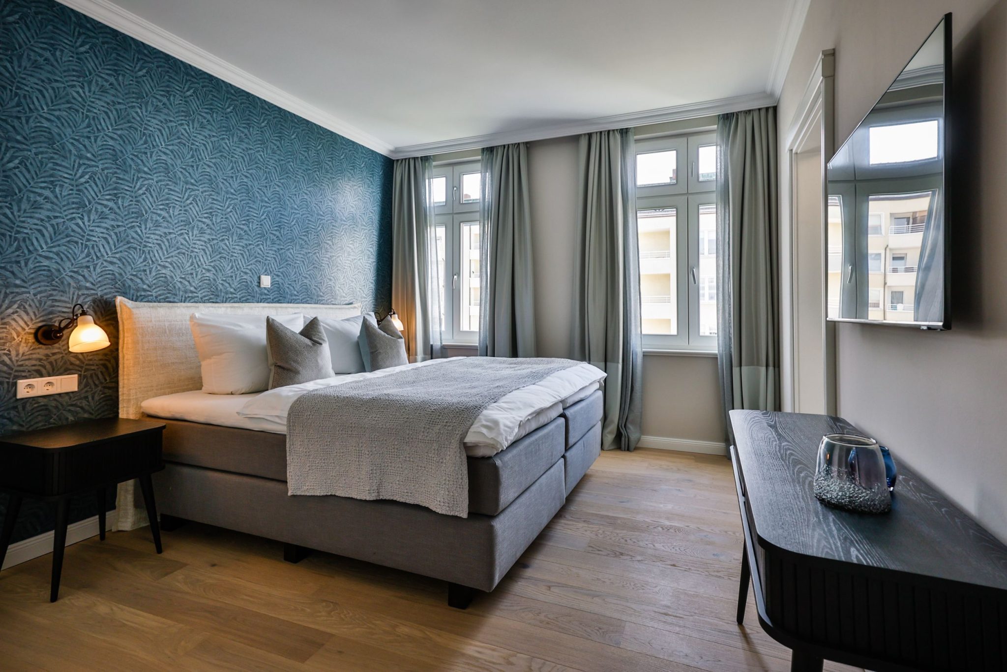 Schlafzimmer mit Doppelbett in Ferienwohnung auf Sylt