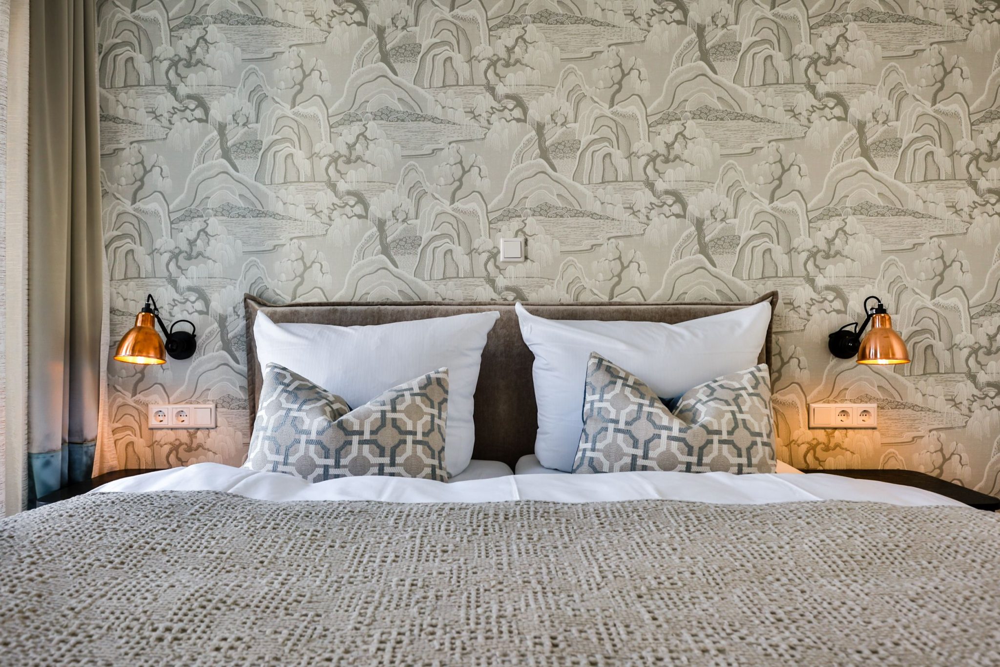 Schlafzimmer mit Doppelbett in Ferienwohnung auf Sylt