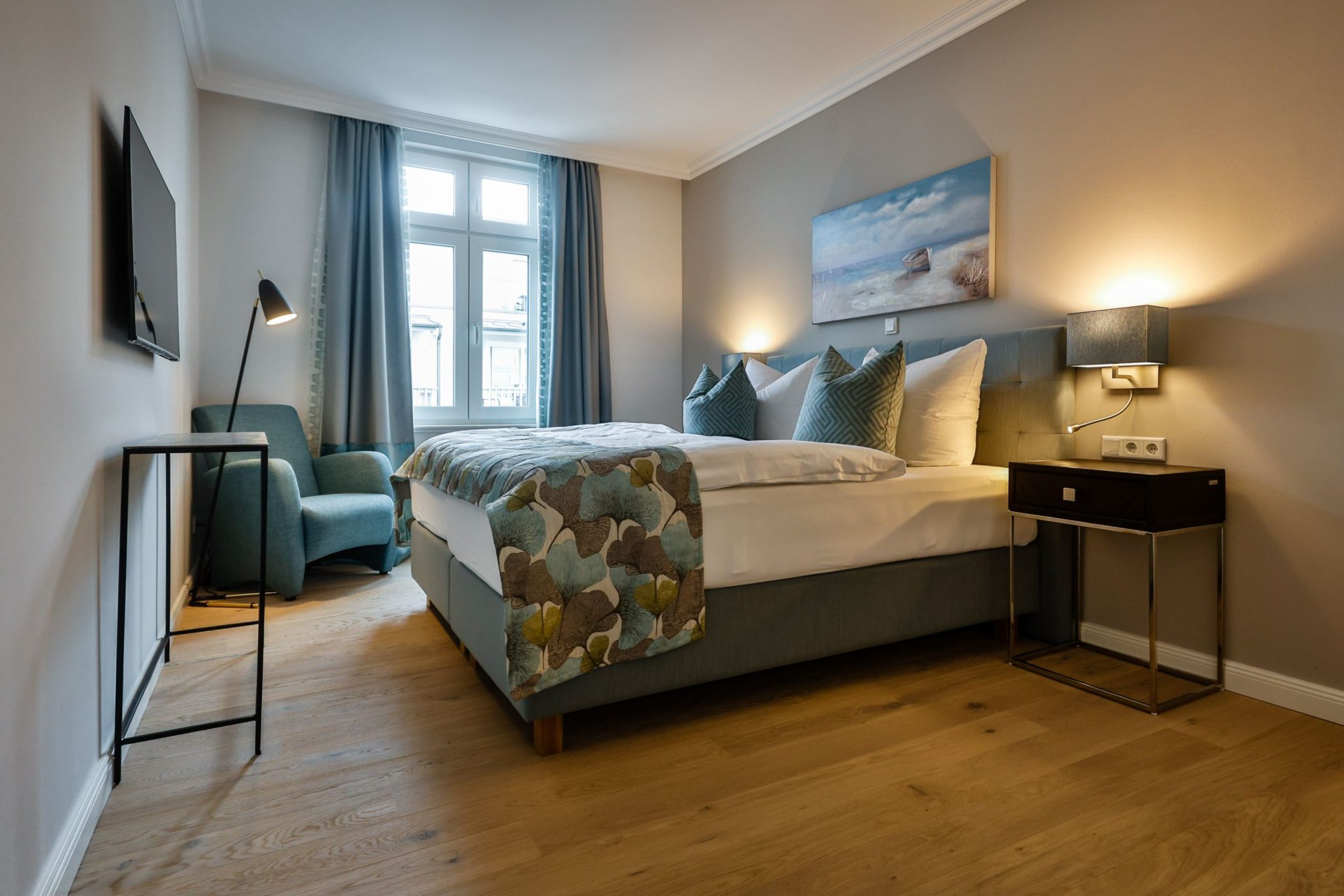 Schlafzimmer mit Doppelbett in Ferienwohnung auf Sylt