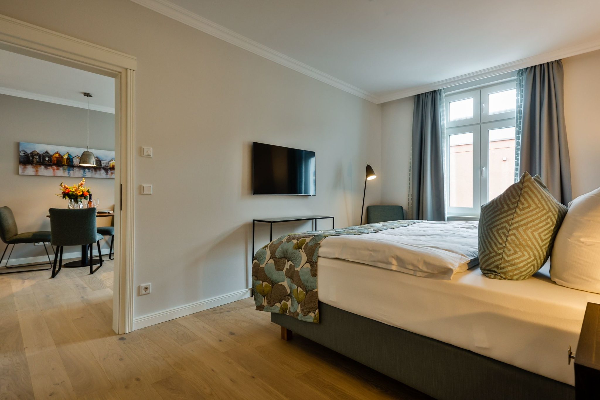 Schlafzimmer mit Doppelbett in Ferienwohnung auf Sylt