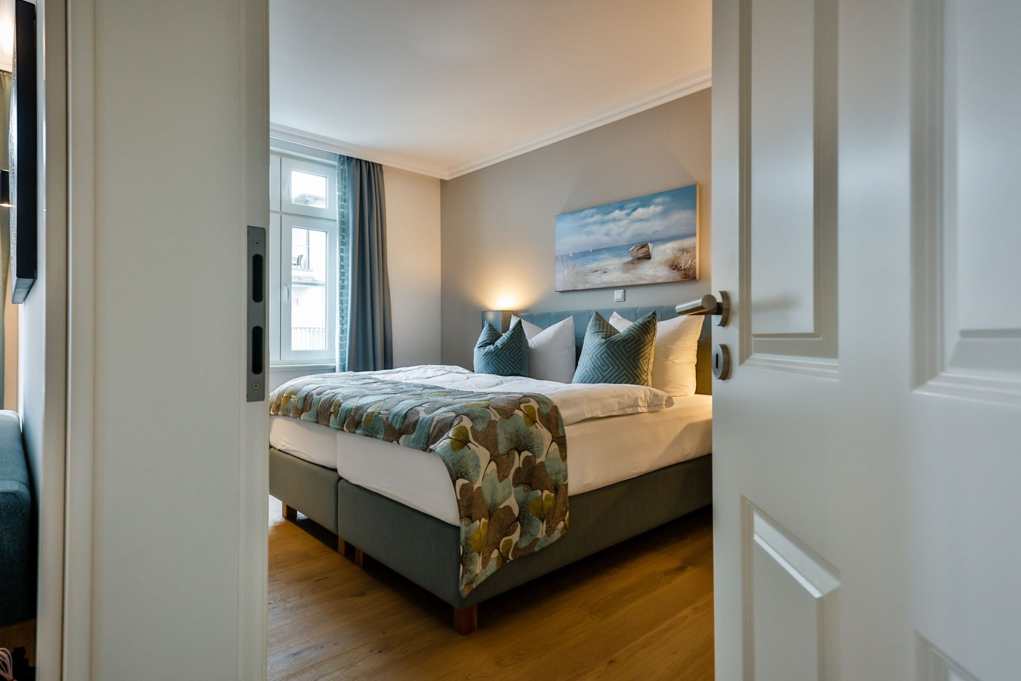 Schlafzimmer mit Doppelbett in Ferienwohnung auf Sylt