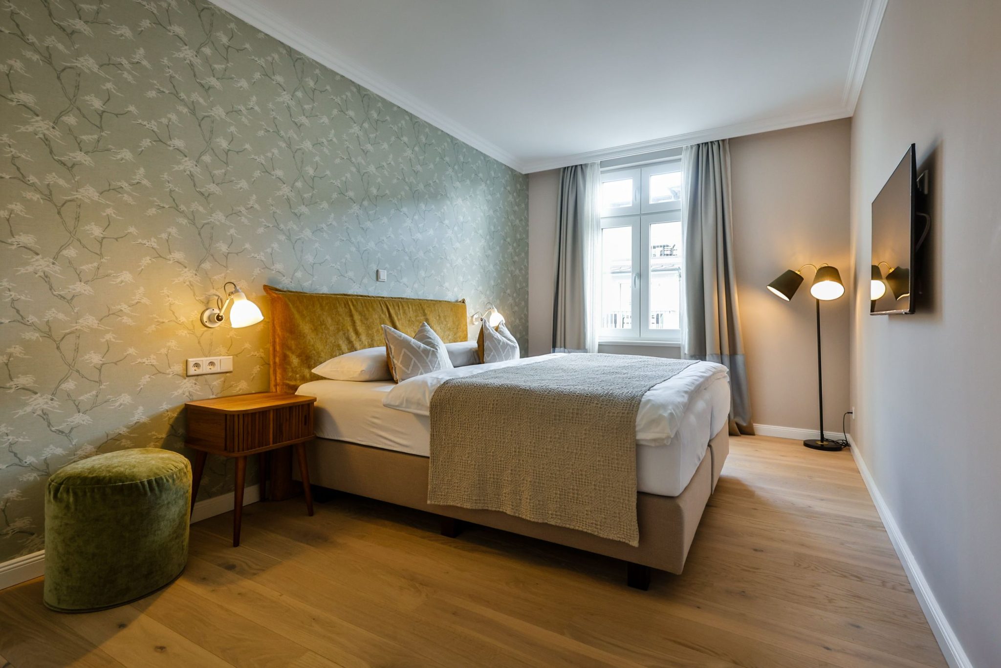 Schlafzimmer mit Doppelbett in Ferienwohnung auf Sylt