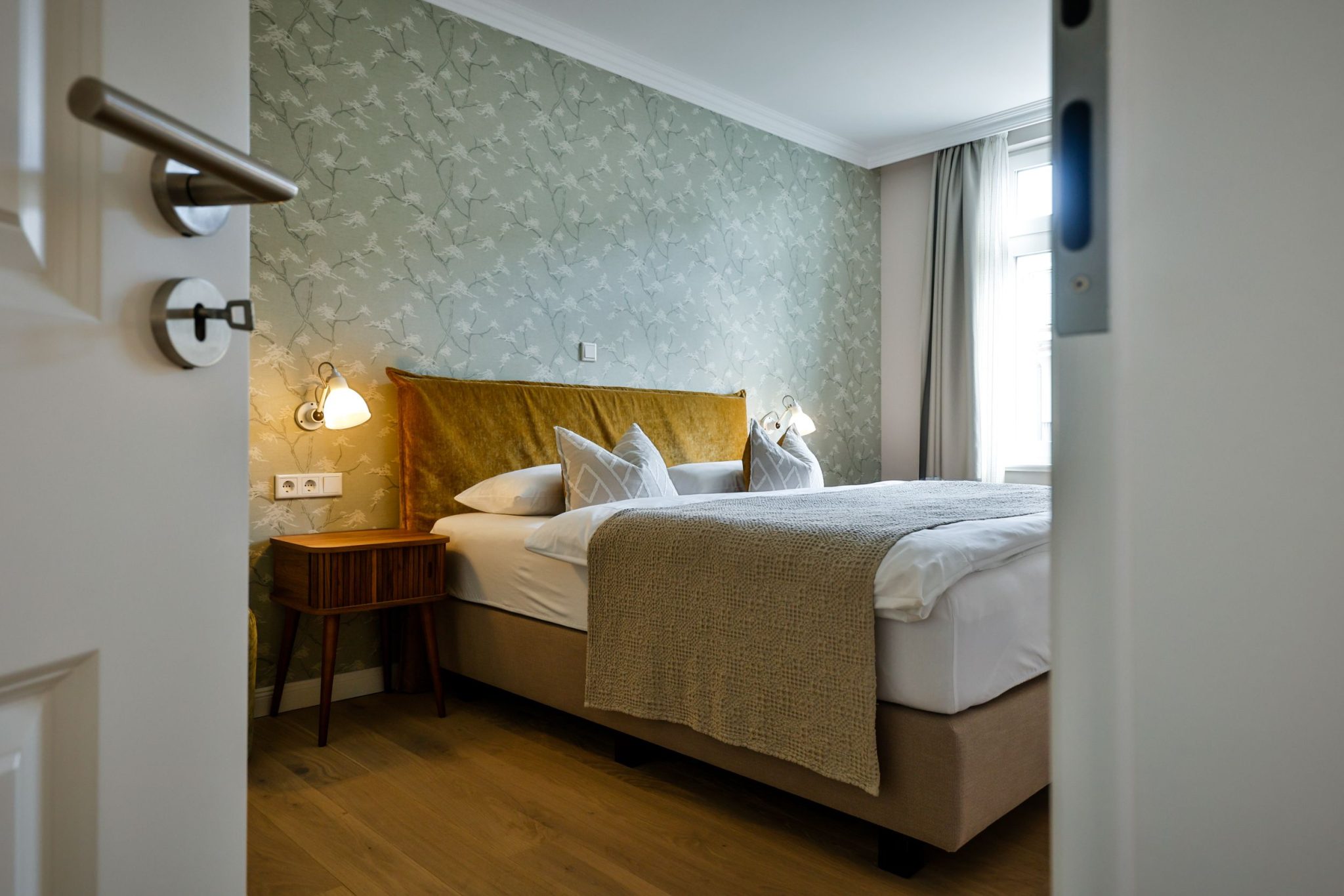 Schlafzimmer mit Doppelbett in Ferienwohnung auf Sylt