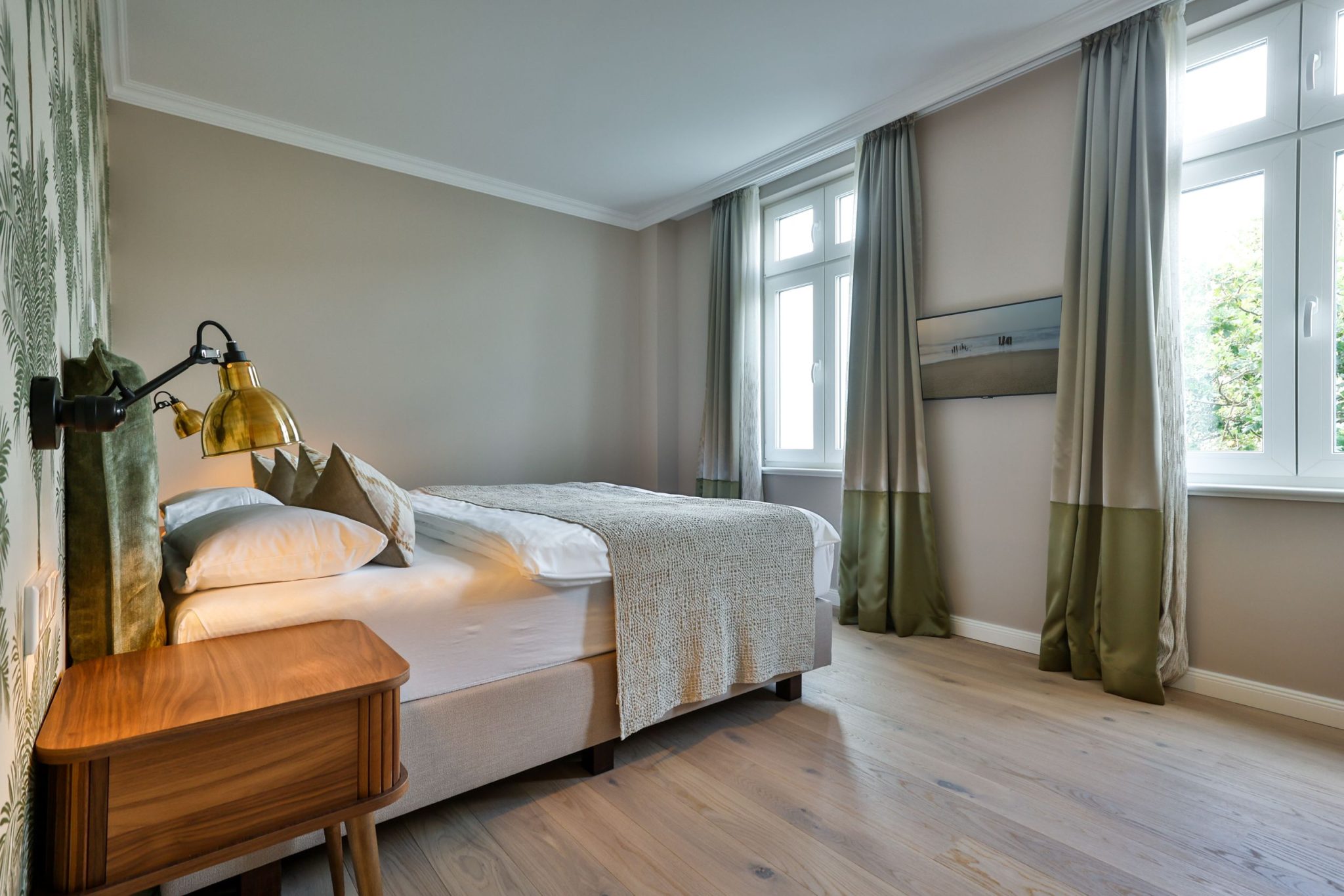 Schlafzimmer mit Doppelbett in Ferienwohnung auf Sylt