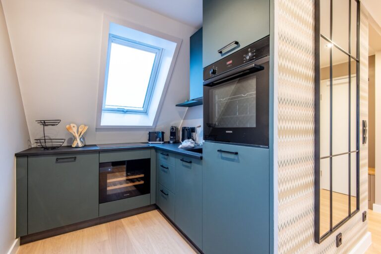 Küche mit Ofen in Ferienhaus auf Sylt