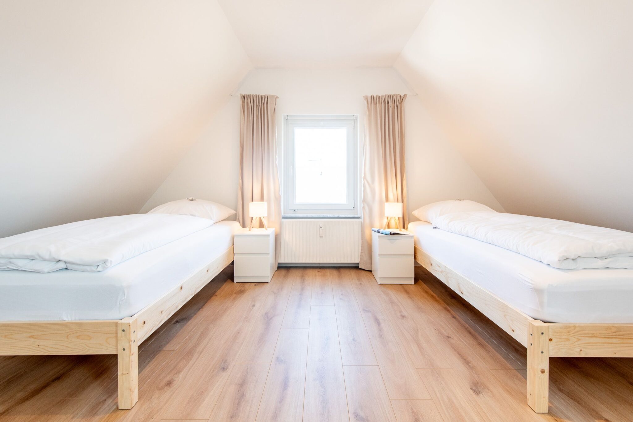 2 Einzelbetten in einem Ferienhaus auf Sylt