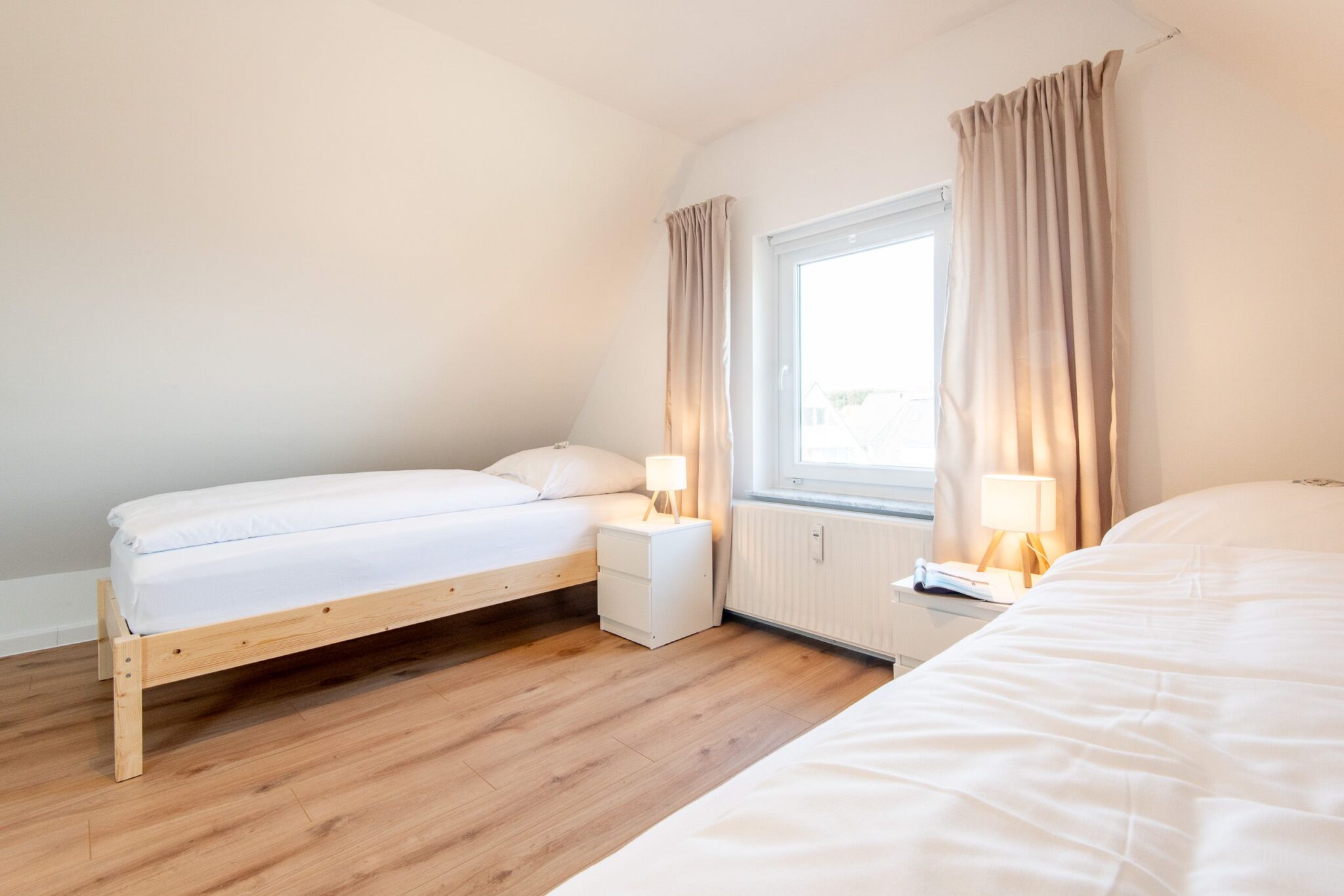 2 Einzelbetten in einem Ferienhaus auf Sylt