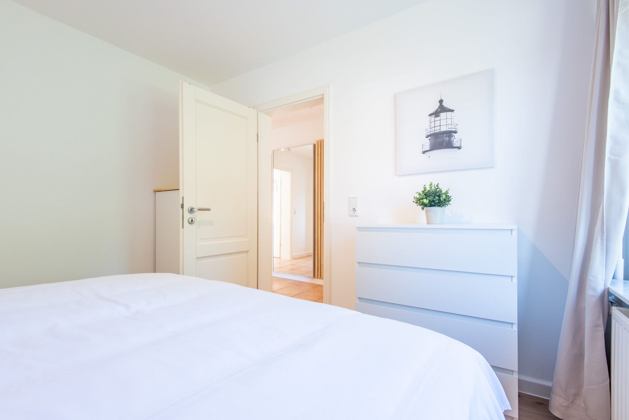 Schlafzimmer in einem Ferienhaus auf Sylt