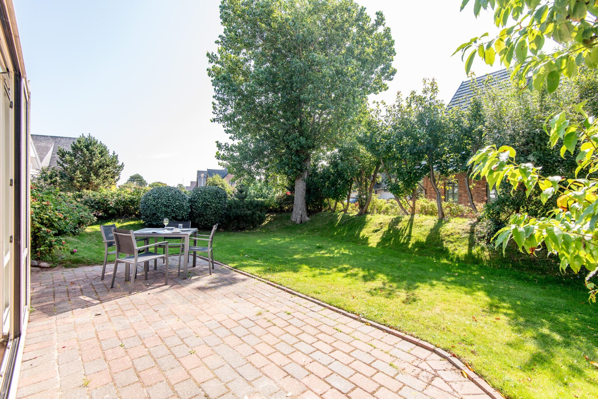 Garten und Terrasse von einem Ferienhaus auf Sylt