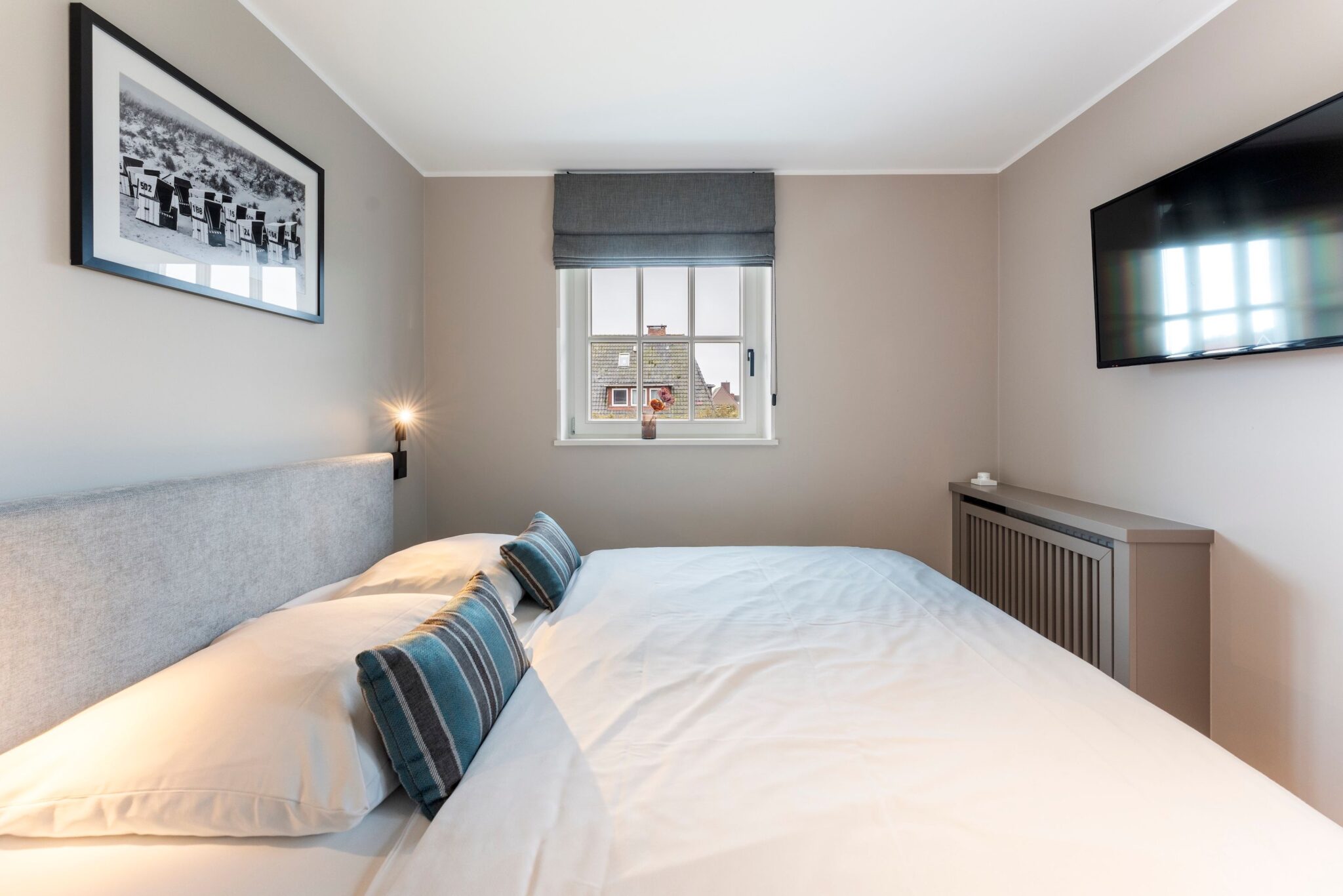 Schlafzimmer einer Ferienwohnung auf Sylt